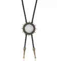 Detail of vintage bolo tie showing sunburst metal slider with iridescent white stone - White