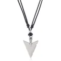 Detailed macro view of vintage arrow pendant on adjustable black braided cord necklace - Arrowhead Shape