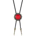 Retro mens bolo tie featuring a bronze sunburst pendant with a red gemstone on black cord - Red