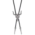 Detail of vintage silver bull skull bolo tie with floral engraving and black braided cord - Bull Skull Style B