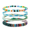 Set di 4 braccialetti dell'amicizia boho con perline colorate e cordoncini di cotone intrecciati - Stile Arancio Blu Vivace (Stile C)