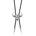 Detailed view of vintage silver bull head bolo tie with engraved turquoise star patterns - Vintage Bull Head / Bull Head (Black Cord)
