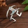 Bracciale rigido stile cowboy vintage con ciondolo stivale turchese e finitura martellata - Stile Stivale