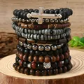 Macro shot of Bohemian multi-layer beaded bracelets with cross charm on wood - Cross Style