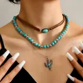 Bohemian layered necklace set featuring turquoise beads and a silver cactus pendant - Cactus Choker (5)