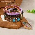 Bracciale bohémien multistrato con perline di legno, turchese e ciondolo a goccia - Multicolore