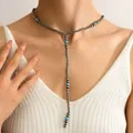 Detail of bohemian Y-shaped lariat necklace with turquoise beads on female model - Y-Shape Lariat Tassel Style (Style 3)
