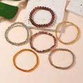 Set di 6 bracciali elastici in cristallo sfaccettato in tonalità terra e texture naturali - Stile Caffè