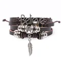 Vintage layered leather bracelet with silver 'Believe' charm and feather pendant - Believe Tag And Feather Style