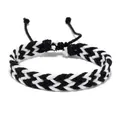 Close-up of black and white braided wax cord bracelet with adjustable sliding knot - Black and White Woven (30272)