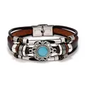 Dettaglio di bracciale in pelle multistrato con occhio di gatto blu e chiusura magnetica in acciaio - Blu Occhio di Gatto