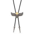 Close-up of a vintage bolo tie featuring a detailed gold and silver eagle with black braided rope - Indian Style Eagle
