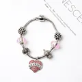 Bracelet à billes argenté avec perles roses et pendentif coeur Grandma sur fond blanc - GRAND-MÈRE Rose