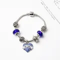 Bracelet chaîne serpent argenté avec perles bleues et pendentifs cœur couronne - MIMI Bleu