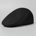 Nahaufnahme von dickem Wollstoff und präzisen Nähten an der schwarzen Schirmmütze - M (56-58cm) / Schwarz