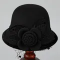 Detail of vintage wool cloche hat with black mesh veil and large flower decoration - M (56-58cm) / Black