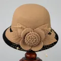 Close-up of elegant camel wool felt hat featuring mesh veil and handmade flower detail - M (56-58cm) / Camel