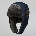 Detailed view of winter trapper hat showing thick grey faux fur lining and windproof earflaps - M (56-58cm) / Navy Blue