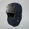 Close-up of winter trapper hat with gray faux fur lining and detachable face mask detail - M (56-58cm) / Navy Blue