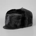 Classic black faux fur Lei Feng hat for men featuring warm plush earflaps and leather brim - Hat