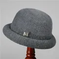 Detail of dark grey cashmere knit hat with sparkling rhinestone M metal ornament - M (56-58cm) / Gray