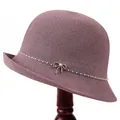 Eleganter lila Damen Strick-Glockenhut mit Strassschleife und Perlenverzierung - M (56-58cm) / Altrosa