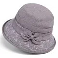 Detailed view of light purple sun hat with white geometric patterns and side bow - M / Light Purple