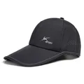 Macro detail of breathable laser-cut holes and K SPORT embroidery on black sports cap - M (56-58cm) / Black
