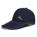 Detail view of navy blue quick-dry cap with laser-cut holes and reflective safety strips - M (56-58cm) / Navy Blue