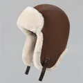 Detail of pilot hat with dark brown leather exterior and thick beige plush faux fur lining - Chocolate