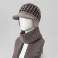 Detail of winter knit ear-flap hat with houndstooth pattern and matching ribbed scarf - Hats And Scarves / Khaki