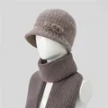 Detail of warm knitted beanie with brim and matching scarf set for elderly women - Hats And Scarves / Khaki