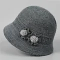 Detail of dark grey knit bucket hat featuring soft wool texture and floral accents - M (56-58cm) / Gray