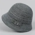 Detailed close-up of dark grey knitted cloche hat with fuzzy texture and silver buckle - M / Gray