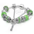 Bracciale con ciondoli placcato argento con cristalli verdi e catena snake da 17-20cm - 17 / Verde