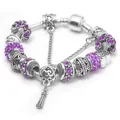 Bracciale vintage placcato argento con cristalli viola e ciondolo a cuore - 17 / Viola