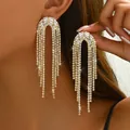 Elegantes pendientes de borla dorados con circonita rectangular y cristales brillantes - Estilo de Borla Dorada