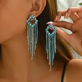 Elegantes pendientes largos con borlas de diamantes azules y diseño de cristal brillante - Borla larga / Plateado/Circonita Azul