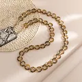 Detail of high-quality acrylic phone lanyard with leopard print links and gold clasp - Light Leopard