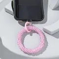 Close-up of pink translucent beaded phone lanyard with a metal spring ring clasp - Pink