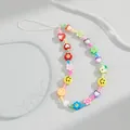 Detail van kleurrijk telefoonkoord met acryl kralen, smileys en fruitbedeltjes - 24cm / Kleurrijke Bloem Fruit Stijl
