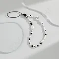 Minimalistische macaron acryl telefoonkabel met zwart-witte kralen en lachende gezichtjes - 25cm / Zwart & Wit Hart Stijl