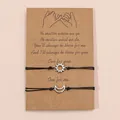 Zwart gevlochten zons- en maancharmes armbandenset voor koppels op een kaart - Zilverkleur Zon Maan