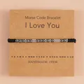 Detail van Morse code armband op kraft kaart met I Love You kralen patroon - I LOVE YOU