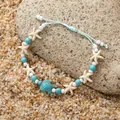 Pulsera estilo océano con tortuga, estrella de mar, cuentas turquesa y cordón azul - Estilo Trenzado de Tortuga Estrella de Mar Cian / Tortuga Azul