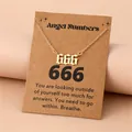 Macro view of gold 666 angel number pendant with gothic font on brown display card - 666
