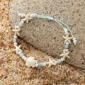 Verstelbare lichtblauwe geweven schildpadiarmband met zeesterbedels voor strandvakantie - Witte Schildpad Zeester Bedeltje Stijl 2 / Gevlochten armband / Wit Combinatie