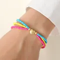 Handmade colorful multilayer bead bracelet set with a polished golden heart charm - Bracelet / Blue/Yellow/Pink