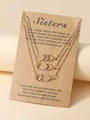 Set van drie gouden kettingen met hartjes en een speciale Sisters-cadeaukaart erbij - Drievoudig Hart / Goud