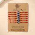 Set van 6 rode gevlochten 7-knopen armbanden met blauw boze oog en gouden kralen - Rode Collectie